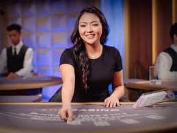 Multi-angle broadcast studio showing live dealers managing blackjack and roulette games on viralbet88 login platform
